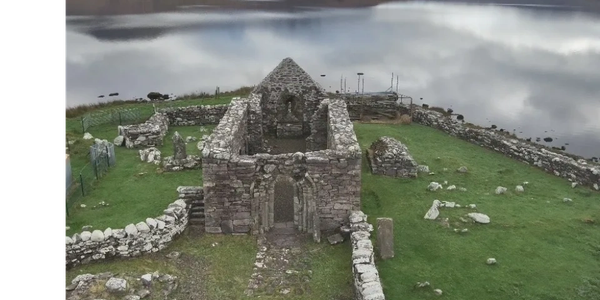 The ancient monastic beehive huts on Skellig Michael, seen from the water.